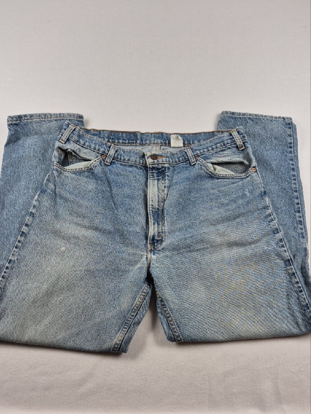 Vintage 90s Levis 550 Relaxed Tapered Jeans 38x32 Light Wash Distressed